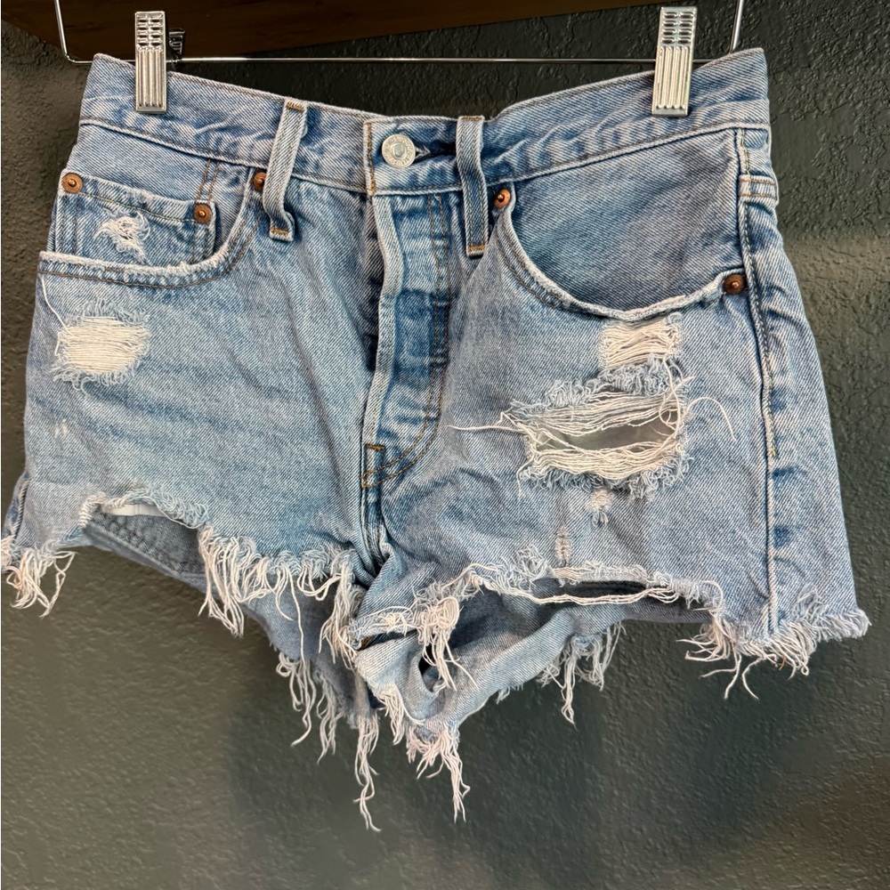Levi’s Distressed Light Blue Denim Cutoff Shorts